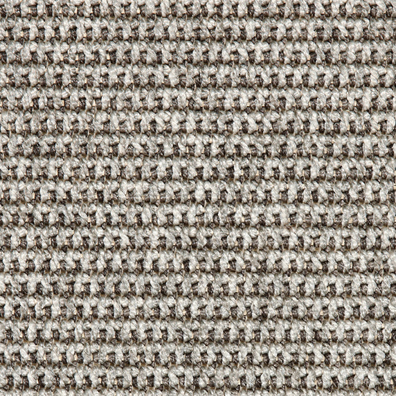 Outdoor broadloom carpet swatch in a textured linear weave in shades of gray and brown.