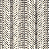 Wool broadloom carpet swatch in a chunky herringbone weave in cream and shades of gray.