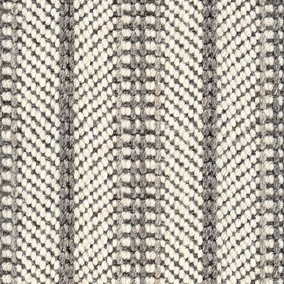 Wool broadloom carpet swatch in a chunky herringbone weave in cream and shades of gray.