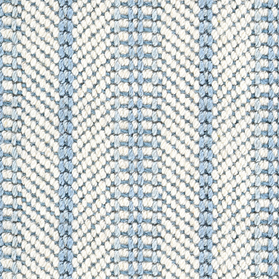 Wool broadloom carpet swatch in a chunky herringbone weave in cream and light blue.