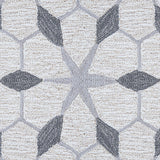 Wool broadloom carpet swatch in a geometric lattice pattern in shades of grey on a cream field.