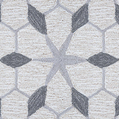 Wool broadloom carpet swatch in a geometric lattice pattern in shades of grey on a cream field.