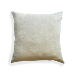 Back of a square throw pillow in a solid light gray color.
