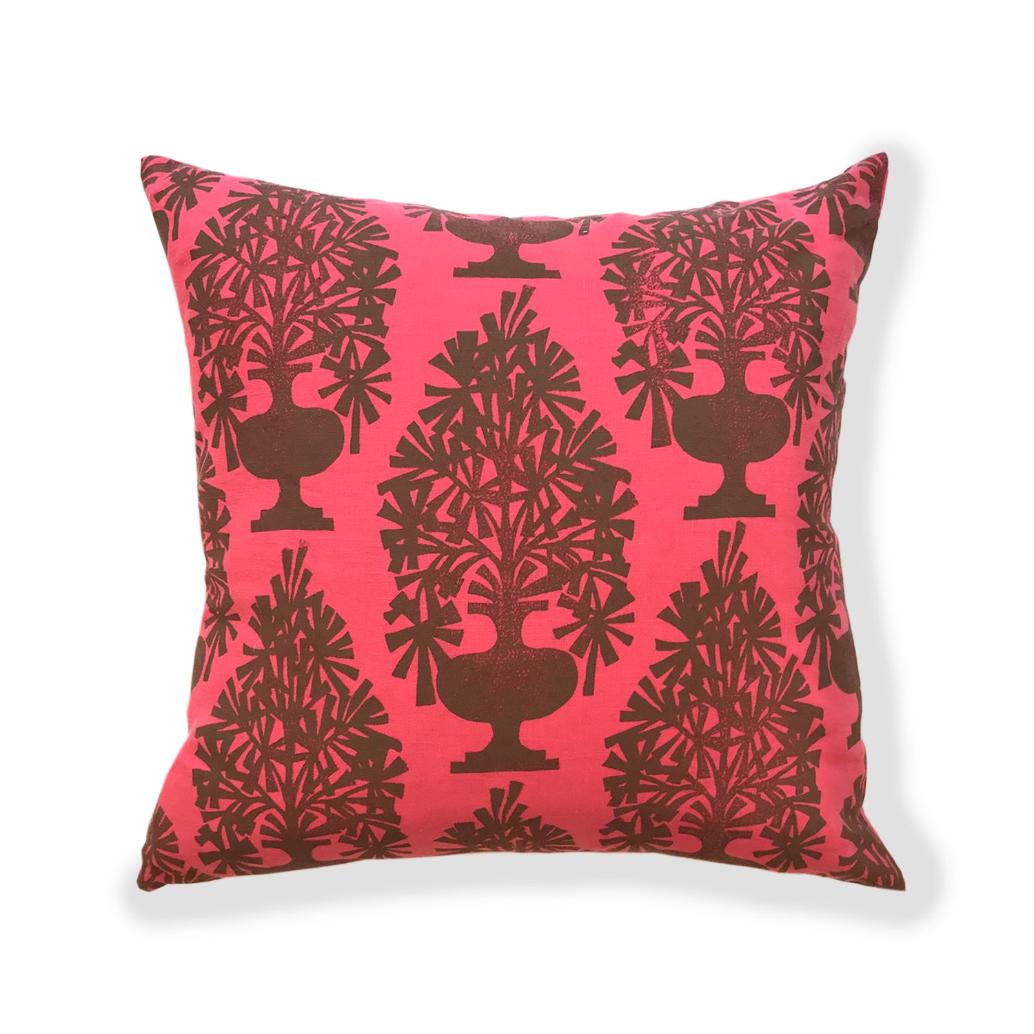 Square throw pillow with a repeating pattern of geometric vases of flowers in brown on a pink field.