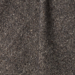 A draped swatch of blended linen-wool mix fabric in a flecked gray color.