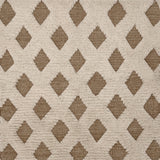 Rug swatch with a repeating tan diamond pattern on a high-pile white field.