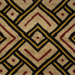 Woven high-pile rug swatch in a Zulu-inspired interlocking diamond pattern in shades of black, yellow, red and tan.