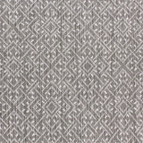 Wool-nylon broadloom carpet swatch in a geometric lattice print in cream and charcoal.