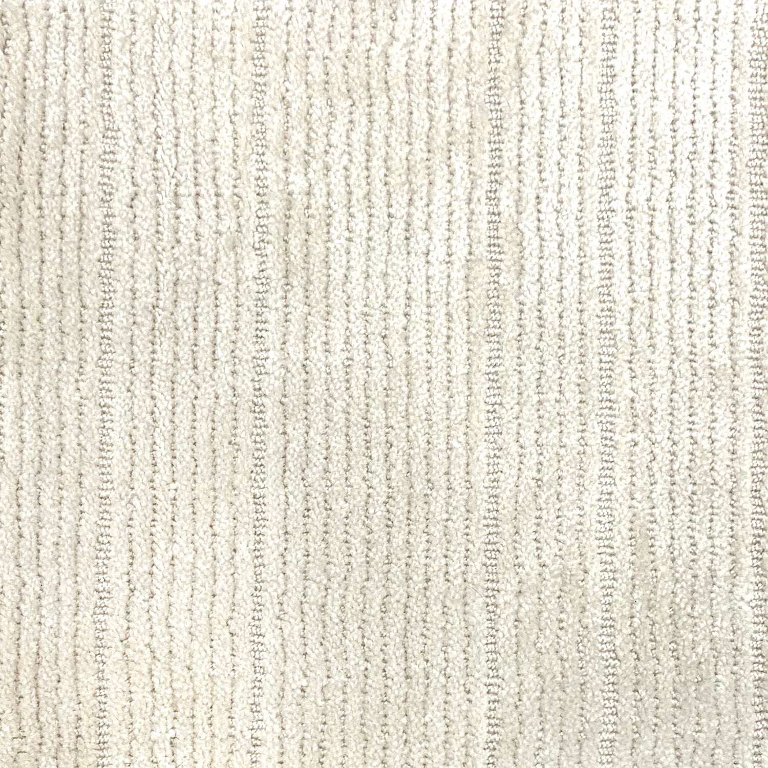 Nylon broadloom carpet swatch in a ribbed weave in ivory.