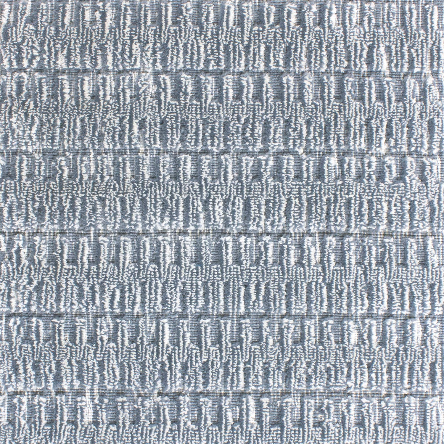 Wool-blend broadloom carpet swatch in a dimensional stripe print in blue-gray.