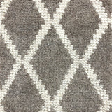Wool-blend broadloom carpet swatch in a cream and brown diamond lattice print.
