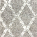 Wool-blend broadloom carpet swatch in a cream and light brown diamond lattice print.