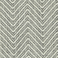 Wool broadloom carpet swatch in a chunky herringbone weave in white and charcoal.