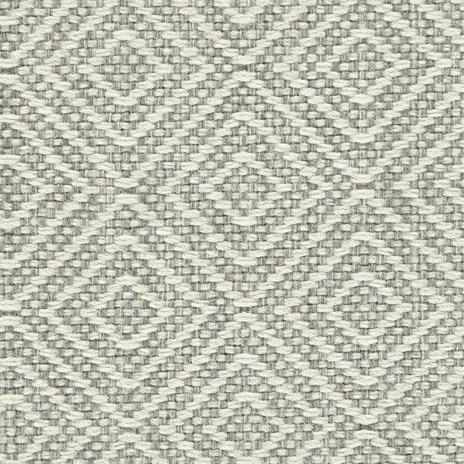 Wool broadloom carpet swatch in a chunky diamond lattice weave in cream and silver.