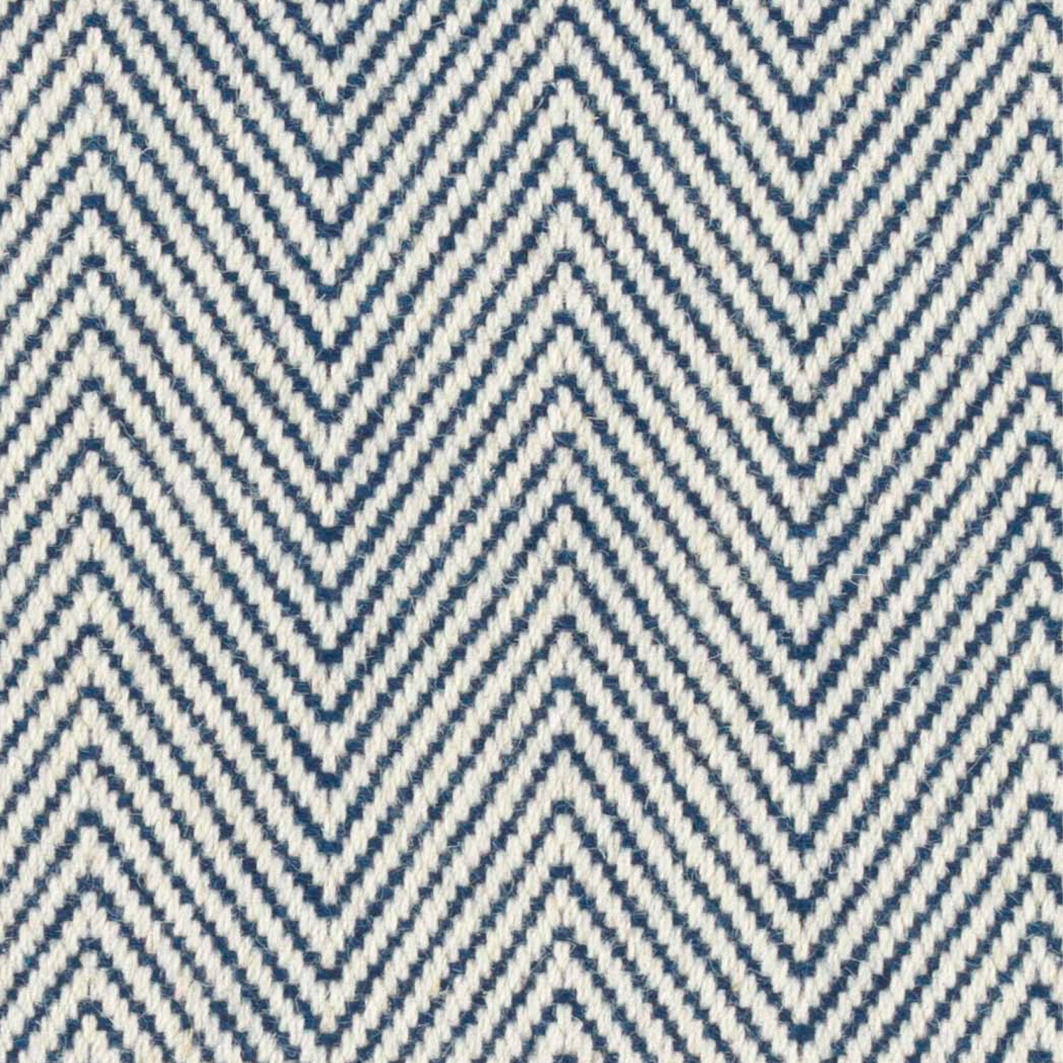 Wool broadloom carpet swatch in a herringbone weave in navy and white.