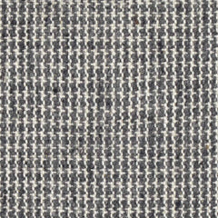 Wool broadloom carpet swatch in a chunky tweed weave in mottled white and charcoal.
