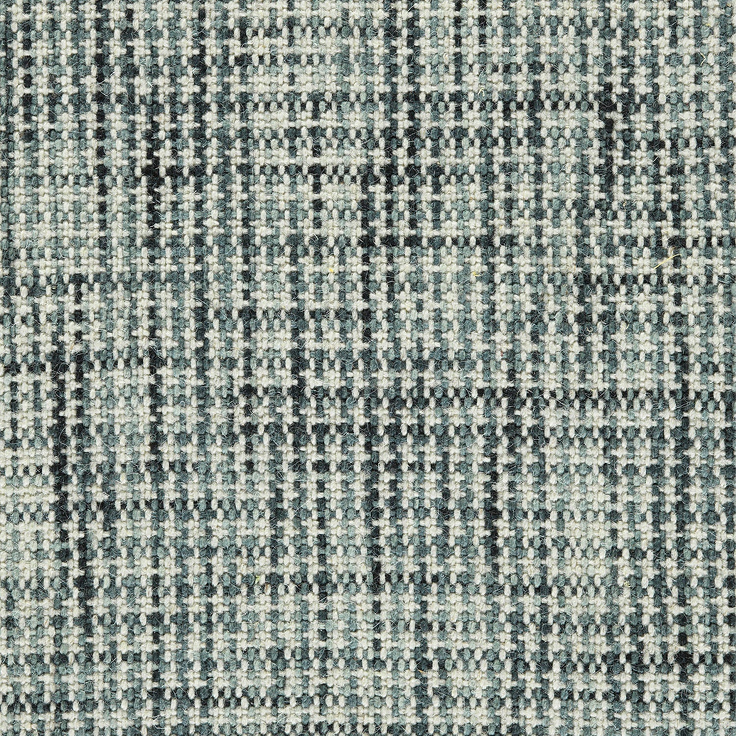 Wool broadloom carpet swatch in a chunky grid weave in mottled shades of white, blue and navy.