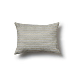 Rectangular throw pillow in a striped pattern of hand-drawn white and brown honeycomb shapes on a tan background.