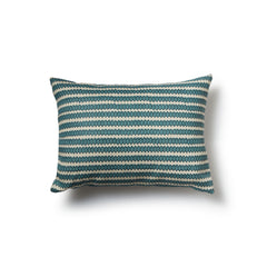 Rectangular throw pillow in a striped pattern of hand-drawn blue and navy honeycomb shapes on a cream background.