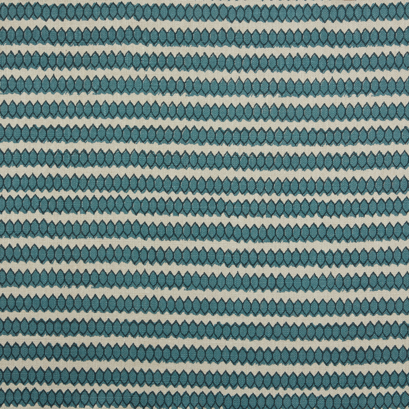 Swatch of fabric with rows of hand-drawn navy and turquoise honeycomb shapes on a cream background.