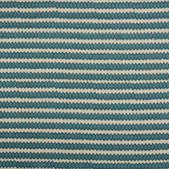 Swatch of fabric with rows of hand-drawn navy and turquoise honeycomb shapes on a cream background.