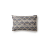 Rectangular throw pillow in a linear pattern with a sand dune-shaped triangle stripe motif in shades of navy, light blue and gray.