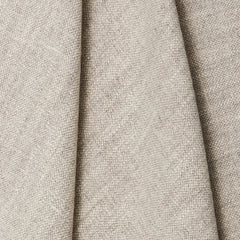 Normandy Fabric shown draped in a warm grey neutral color