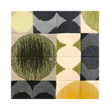 Detail image of Paris Tile rug with a geometric motif of circles and squares in shades of grey, green and yellow with accents of ivory, hover
