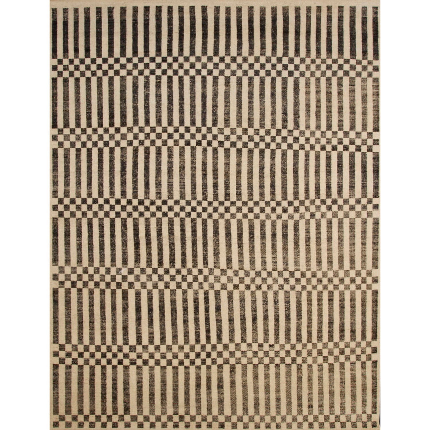 Large rectangular rug in a minimalist plaid pattern of black stripes and checks on a tan background.
