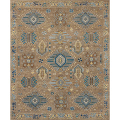 Large rectangular rug in a geometric pattern with a border of stylized bird shapes in shades of blue and yellow on a tan background.