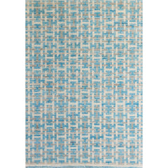 Large rectangular rug with an interlocking linear "gate" pattern in shades of white and gray on a sky-blue field.
