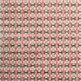 Woven rug swatch in a small-scale grid pattern featuring squares of white, pink, tan and brown.