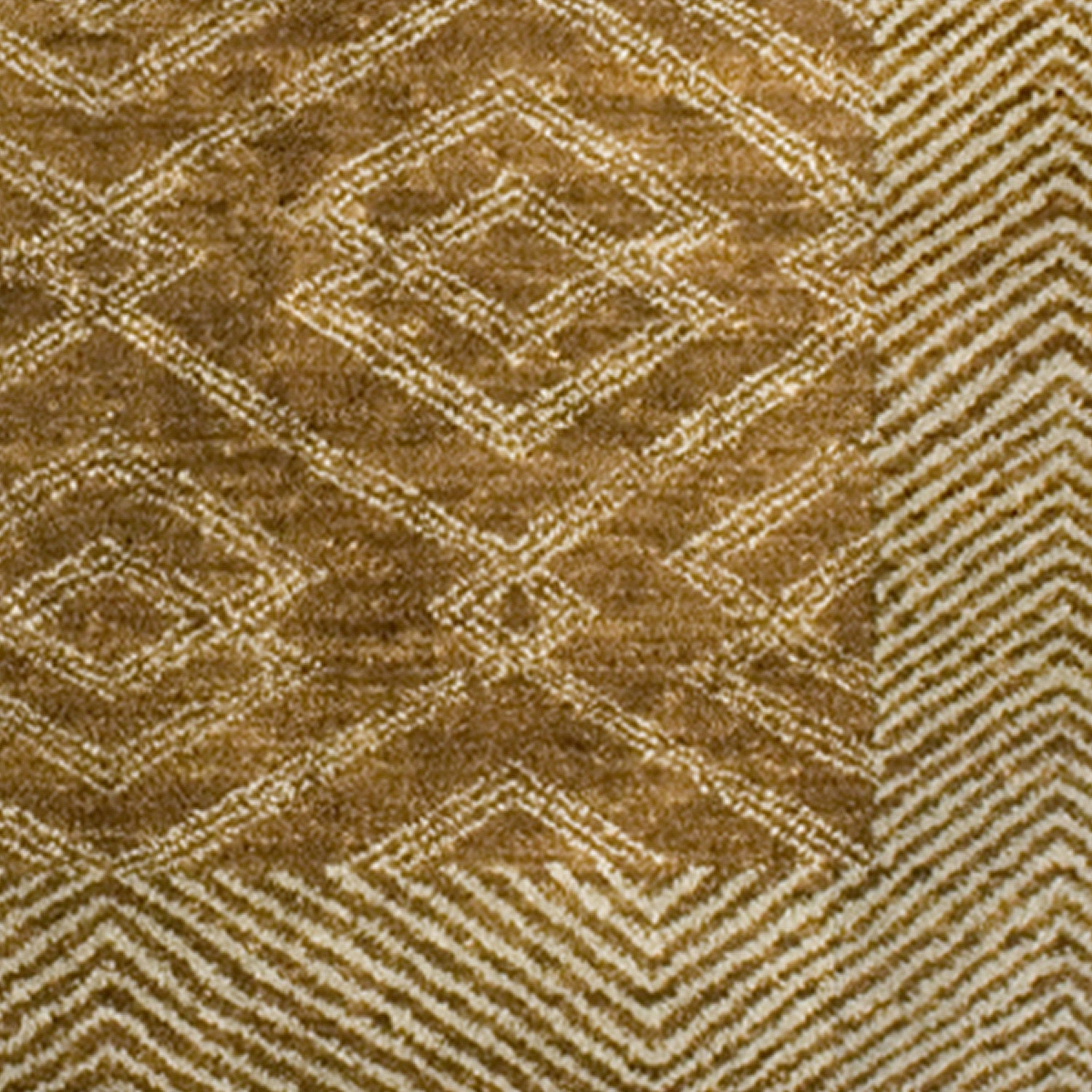 Detail of a woven high-pile rug in an interlocking diamond pattern with a dense stripe border. Pattern is white on a tan field.