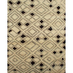 Large rectangular rug in a pattern of graduating diamond shapes in dark brown on a tan field.