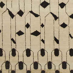 Woven high-pile rug swatch in an abstract "lantern" line pattern in black on a tan field.