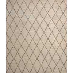 Rectangular high-pile woven rug in a large scale diamond pattern in black on a tan field.