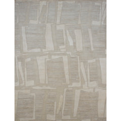 Rectangular rug in an overlapping hand-drawn rectangle pattern in shades of cream and light gray.