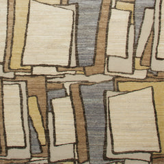 Woven rug swatch in an overlapping hand-drawn rectangle pattern in shades of cream, gray, tan and brown.