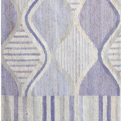 Woven rug swatch with an abstract curvolinear pattern and striped borders in shades of purple and cream.