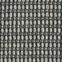 Wool-sisal broadloom carpet swatch in a chunky grid weave in navy and tan.