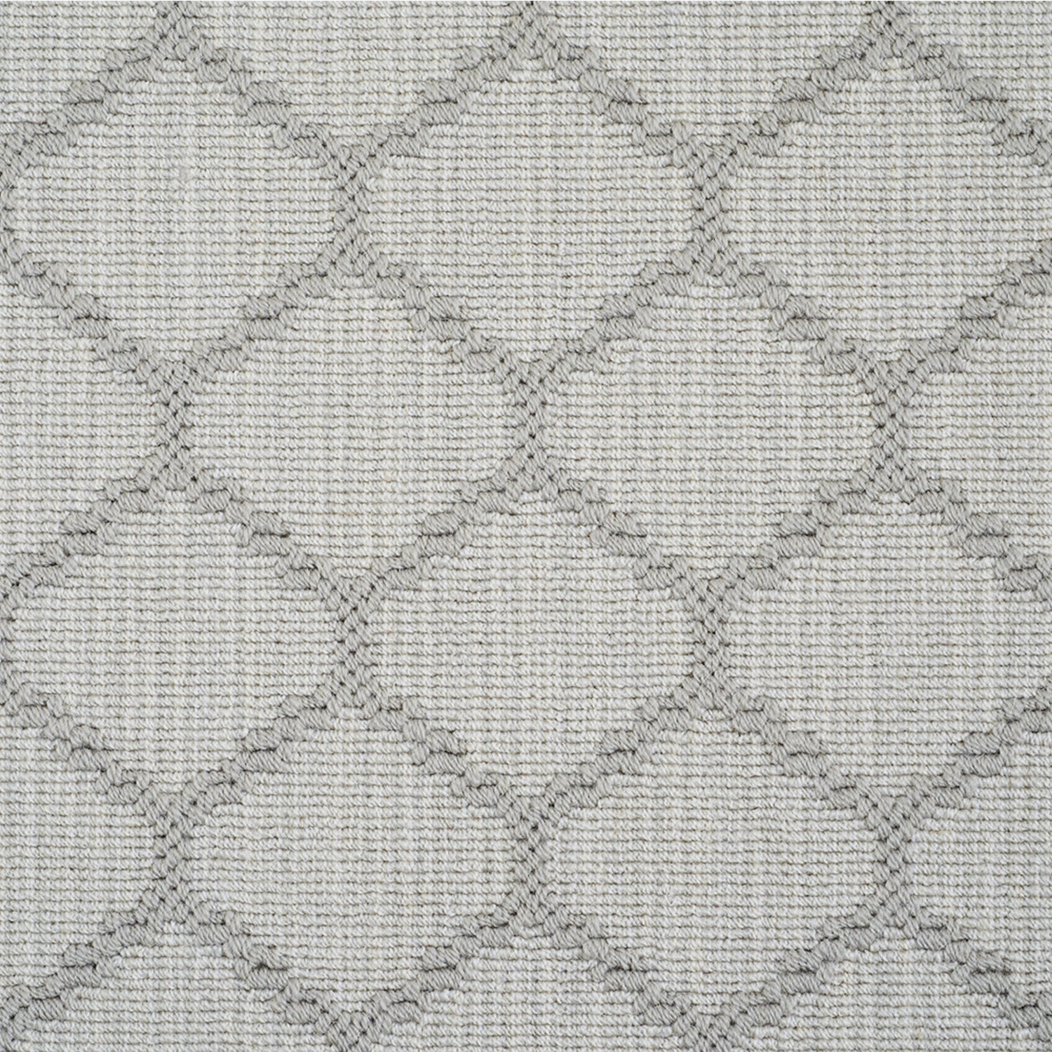 Wool-blend broadloom carpet swatch in a chunky lattice weave in gray on a mottled silver field.