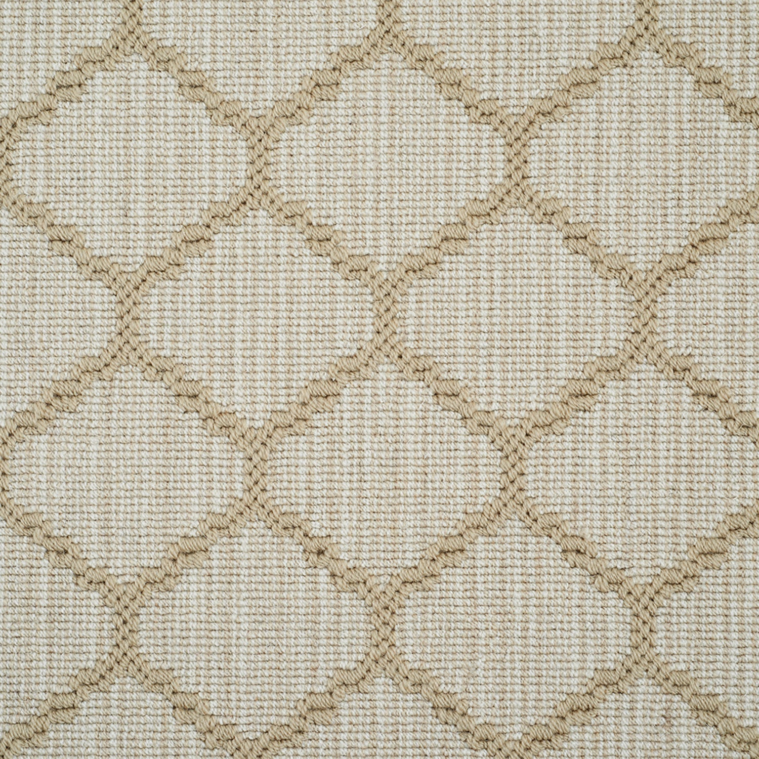 Wool-blend broadloom carpet swatch in a chunky lattice weave in tan on a mottled cream field.