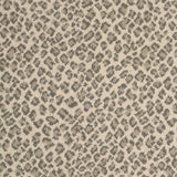 Wool-blend broadloom carpet swatch in a small scale animal print pattern in gray and tan on a cream field.