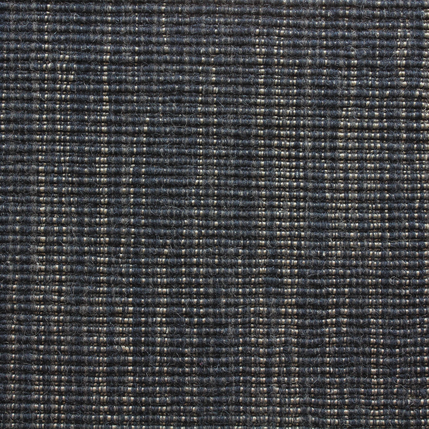 Wool-blend broadloom carpet swatch in a ribbed weave in mottled navy and tan.