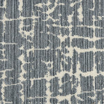 Wool-blend broadloom carpet swatch in an abstract grid pattern in cream on a mottled gray and blue field.
