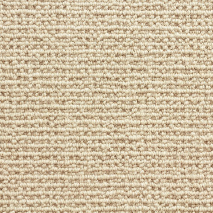 Wool broadloom carpet swatch in a chunky loop weave in cream.