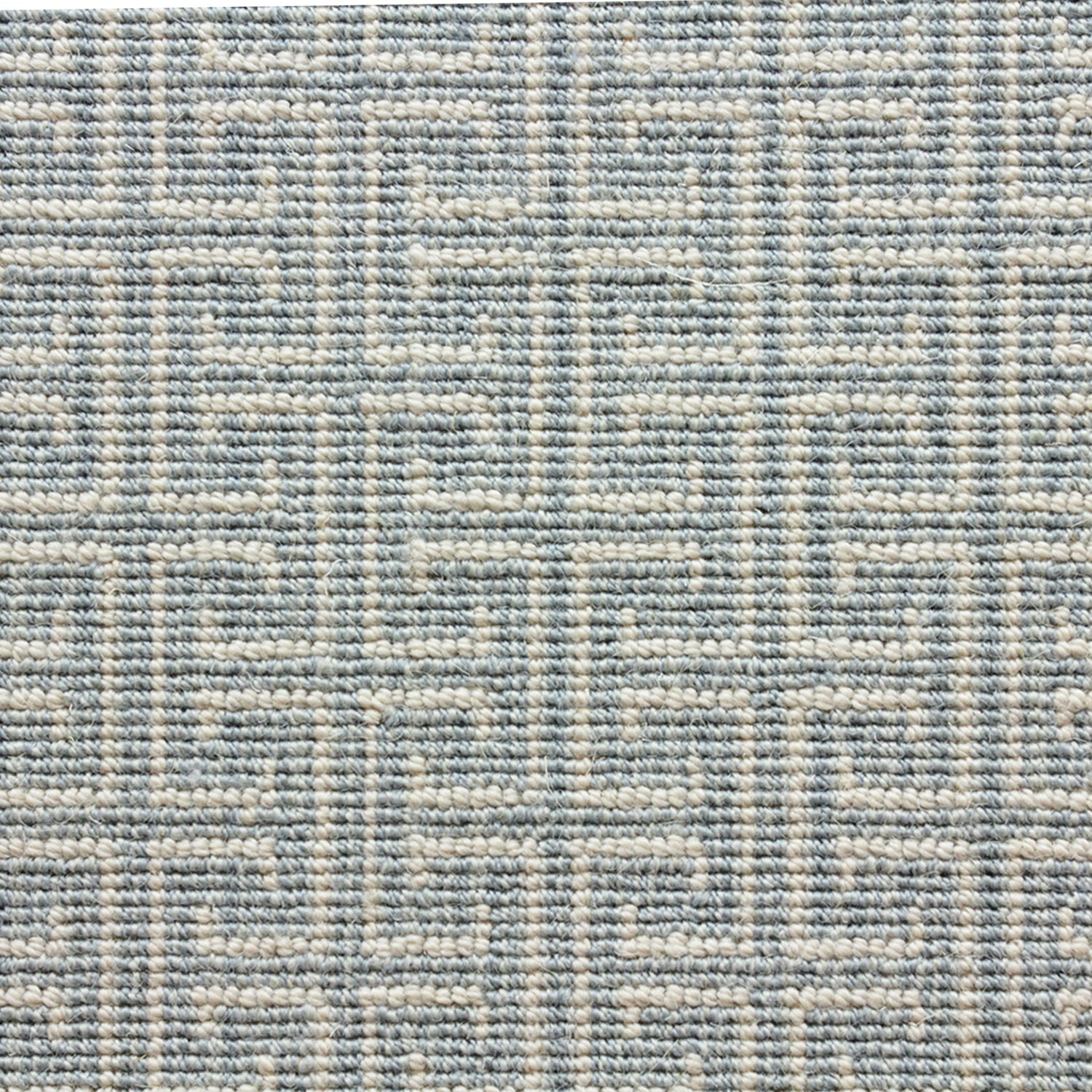 Wool-blend broadloom carpet swatch in an interlocking linear print in sky blue on a cream field.