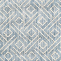 Wool-blend broadloom carpet swatch in a geometric line and square pattern in cream on a sky blue field.