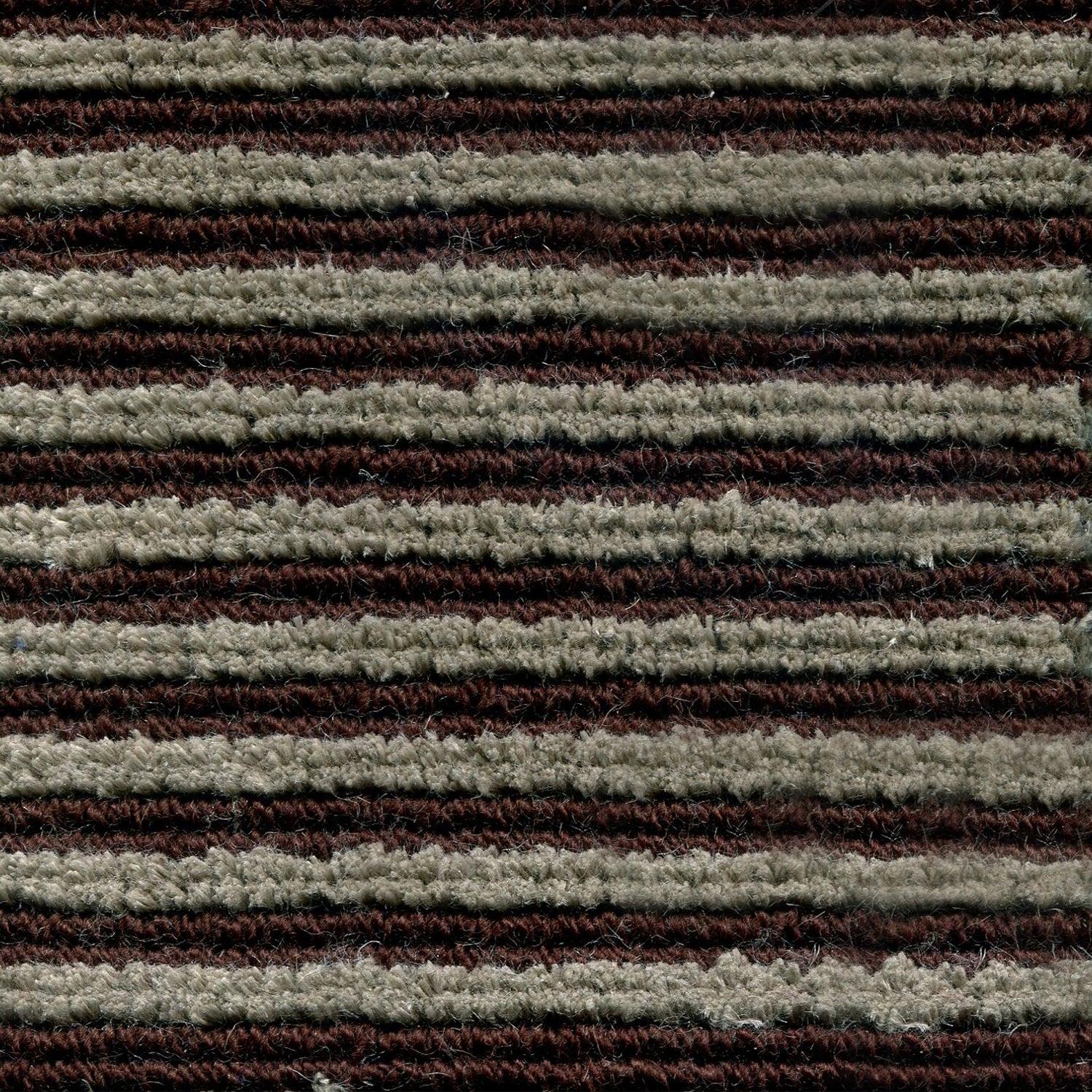 Wool-linen broadloom carpet swatch in a chunky striped weave in shades of gray and dark brown.