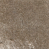 Synthetic blend broadloom carpet swatch in a cut pile texture in light brown.